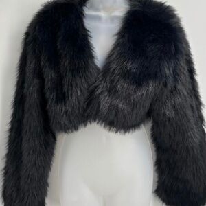 Brand new never worn  Free people black faux fur bolero size xs but runs big